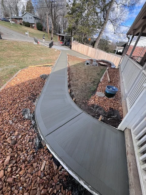 Concrete patio in Huntsville AL backyard outdoor living space